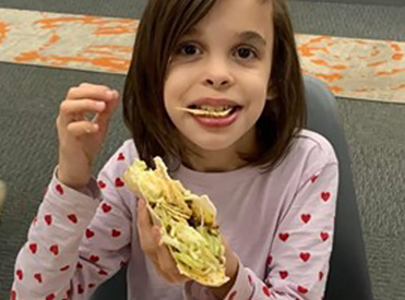 Girl-eating-burrito